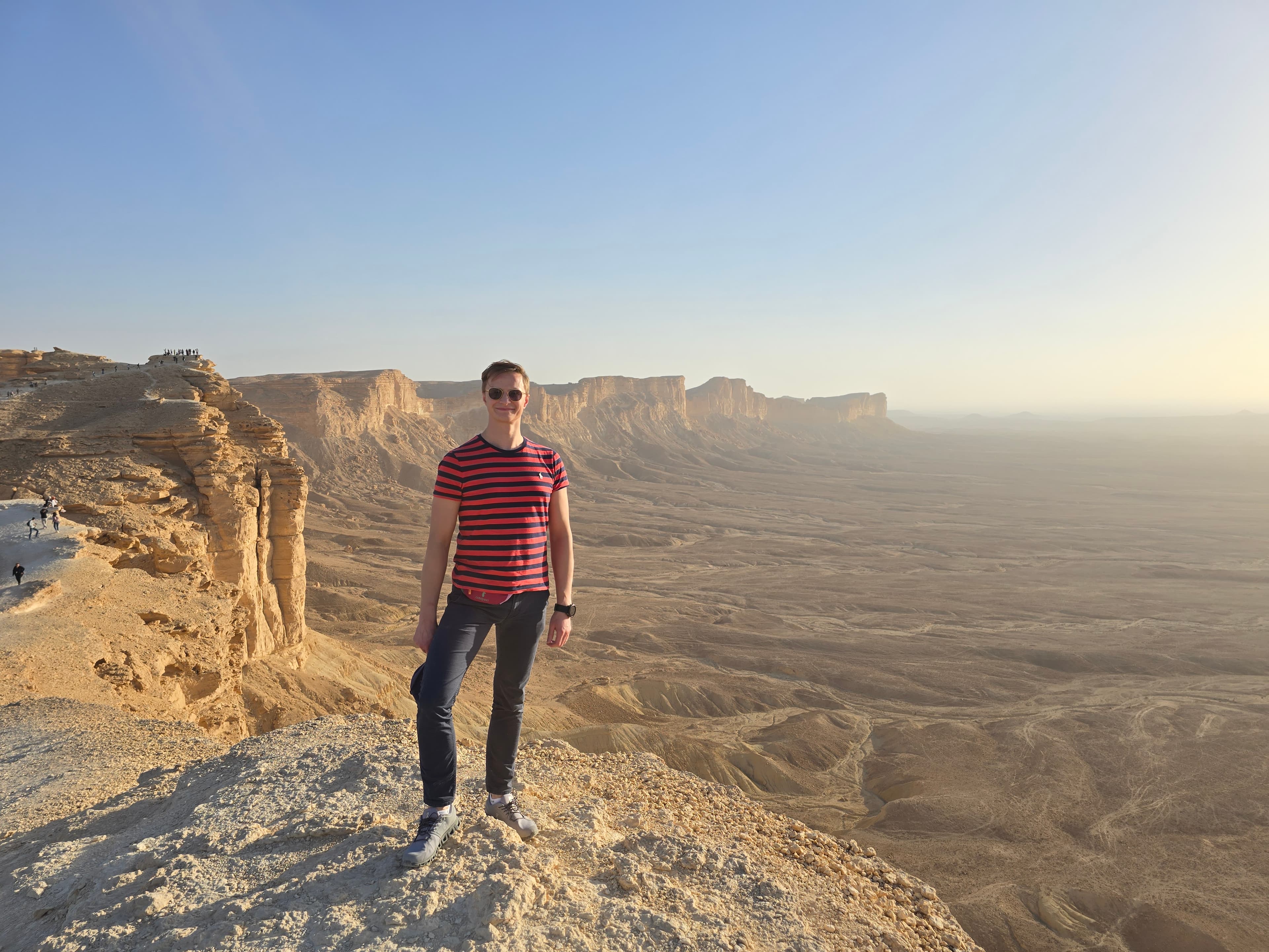 Standing on the Edge of the World cliffs outside Riyadh, Saudi Arabia